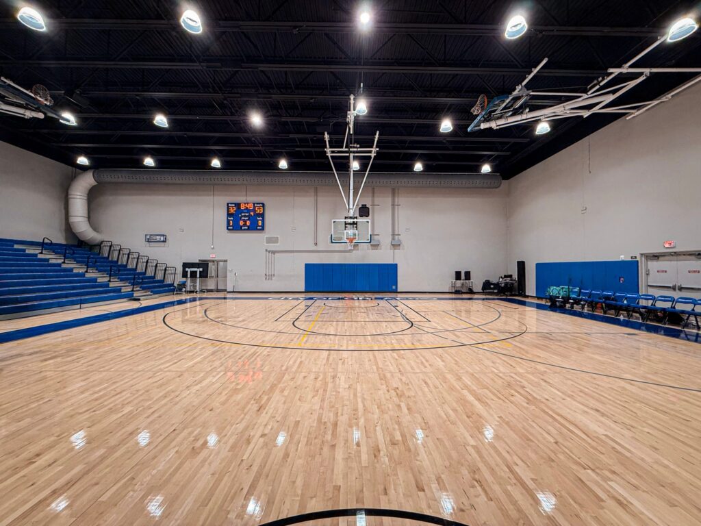 Empty indoor basketball court, used as a generic image for a British basketball player committing to NCAA Division I.