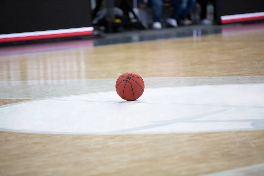 Basketball on an indoor court, used as a generic image for a Hoopsfix Pro-Am preview.