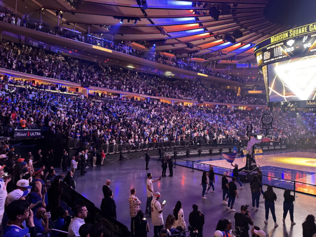 A packed Madison Square Garden crowd watches the New York Knicks against the San Antonio Spurs.