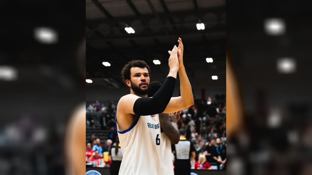 Great Britain player applauds the crowd after the FIBA World Cup qualifier against Iceland in Manchester.