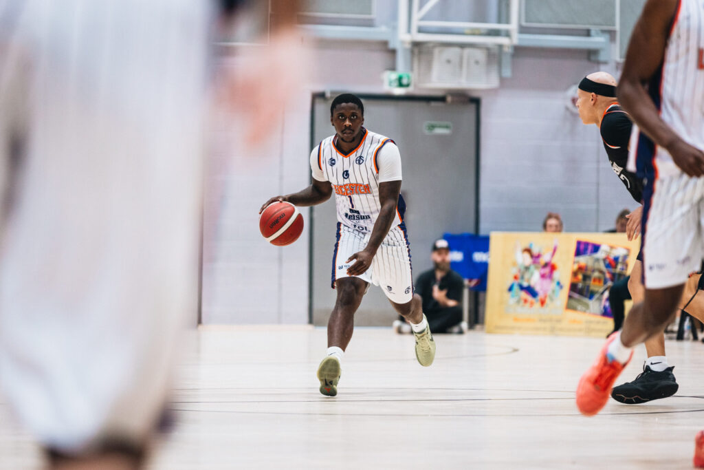 Leicester Riders player dribbling during team action ahead of the London Lions game